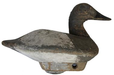 E373 Early Canvasback Hen with very unusual hand-chopped body and wooden keel with iron weight. Glass eyes. Tight crack to the neck. Circa 1940�s � Bishop Head Club - Maker unknown.  Measurements: 14� long x 10� tall with keel/weight x 6 1/2� wide