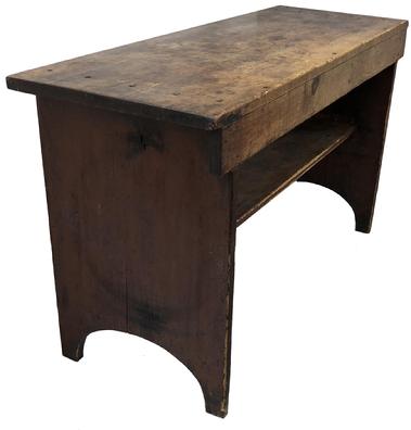 E314 Early 19th century Lancaster County Pennsylvania, Bucket bench, retaining it's original dry red paint surface. Very unusual form, having a 3/4 shelf below, high arched cut out ends, one board white pine square head nail construction. circa 1820  Measurement 50 1/4" wide x 18" deep x 28" tall