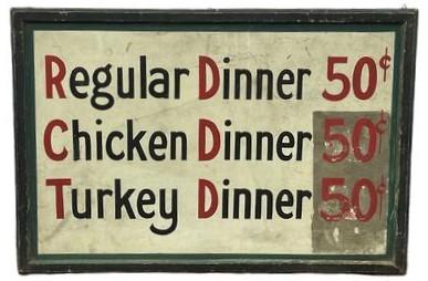 K279 Trade sign - advertising Regular Dinner 50c, Chicken Dinner 50c, and Turkey Dinner 50c. Letters are painted on board in black and red on a white background with a green border. Sign boasts a green painted applied molded wood edge on all sides. Measurements: 37 wide x 1 ½ thick (molding) x 25 tall.  