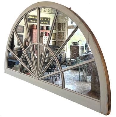 H300 Mid-19th century upcycled Architectural arched dome top window sash with early mirrored back. Weathered surface - retaining original gray paint. A fantastic secondary arched interior molded edge mullion mimics the overall arch. That, along with seven individual molded edge mullions placed in a fan style pattern, creates the visually appealing appearance of a beautiful 16 lite transom. Primarily mortised and pegged construction. Heavy and very sturdy. Measurements: 61� wide x 33� tall x 1 5/8� thick. 
