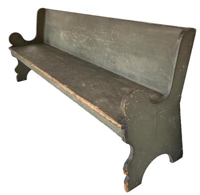H315 Important Lancaster County, Pennsylvania high back Settle boasting finely scalloped ends with lollipop cutouts. All original in the old green painted surface with nicely canted back and very elaborate shaped ends that are double mortised through the sides. Wide, white pine one-board, square head nail construction.  The bench is very sturdy and a great piece of Americana. Measurements are 88" long x 34" tall x 21 1/2" deep