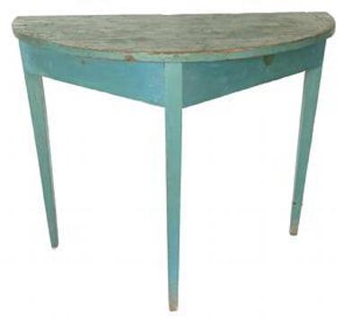 F457 19th century Maryland demilune table in old blue over the original gray paint. Table is circa 1880s and features a semi-circular top over a plain, triangular-shaped apron. This table is raised upon three squared legs which gently taper towards their feet. The wood is pine and oak (oak legs and pine top) Measurements: 36" wide x 32" tall x 17" deep