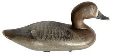 J246 Bluebill Hen decoy carved by Madison Mitchell (1901-1993) of Havre de Grace, Maryland. Original painted surface. Original weight, ring and staple intact on bottom. Circa 1940�s. 
