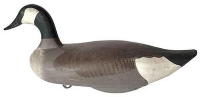 J340 Canadian Goose decoy carved by Madison Mitchell, Havre de Grace, MD (1901-1993) retaining its original painted surface. This is a weighted, full body sized goose decoy measuring approximately 24" long x 11� tall x 10� wide.