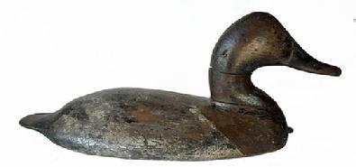 **SOLD** H1024 Will Heverin (1860-1951), Charlestown, Maryland - Canvasback Hen wing duck decoy. Branded "C C" on bottom. Original staple intact on front bottom of decoy.