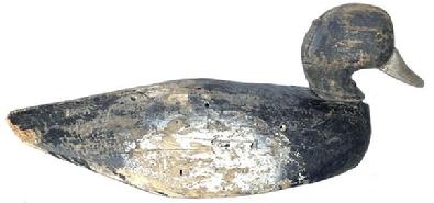 G25 Early 20th century Chrisfield Maryland  Blackhead Decoy, made by  Lloyd J. Tyler 1898-1971  made his first decoy in 1910 in Christfield Maryland, He  live across the street from the Ward Brothers. This Goose, the body is all hand chopped with a real folky head with some  of the original paint remaining . 15" long x 6 1/2�ta