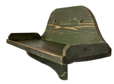 F499 Late 19th century hanging Wall Shelf, with tomb stone top, in original green paint, with shaped sides, late wire nail construction, found in private collection in Pennsylvania. 