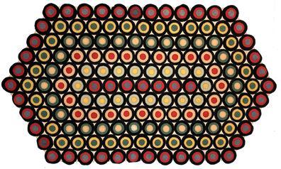 F533 PENNY RUG. late 19th century American Pennsylvania penny rug. Six sides of circular medallions stitched together in colors of red black and mustad green. All edged in i-circles. The rug has been professionly mounted on fram and ready to hang 