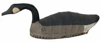 G5 Canvas covered swimming Canada goose decoy North Carolina canvas Goose decoy, in original paint, canvas stretchered over wire body, with wooden shaped head. circa 1950