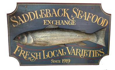 G728 Trade Sign advertising �Saddleback Seafood Exchange� �Fresh Local Varieties Since 1919� with a large, high relief-carved and painted fish in the center featuring detailed fins, scales, tail, mouth, gills and eye. Scalloped, molded-border edges, and vibrant paint colors add to the overall appeal! This mid 20th century Trade Sign