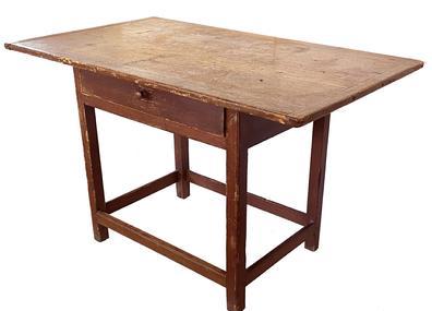 G88 Late 18th century New England Tavern Table, retaining it's early surface circa 1790, the wood is pine, with a one board top with bread board ends, which is held in place with tee nails, over a dovetailed drawer with it's original wooden knob. 