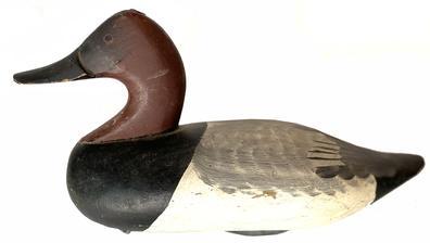 G895 Captain Jess Urie (1901-1978), Rock Hall, Maryland Canvasback Drake.circa 1960 Jess Urie made his living by fishing and running charters. He was a perfectionist and all of his birds had extensive feathering and wing painting. Rigged, in excellent condition 