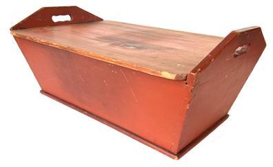 B634 Early 19th century table top Dough Box, This rectangular example, having sharply canted sides with cut out handles and the original removable lid , with a dovetailed case, remains in original red paint.