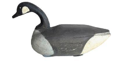 H515 Full sized Canadian Goose Decoy with carved feathers and distinct shelf neck. Original staple and two, very primitive, crossed weights are intact on bottom. Talbot County, Maryland decoy � however the exact carver is unknown.    Measurements: 21 5/8� long x 6 &frac34;� wide x 11 &frac12;� tall. 