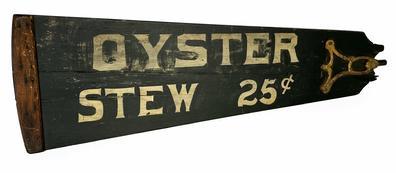 J41 Early 20th century double sided Restaurant Advertising Trade Sign painted on a wooden fan blade. One side reads OYSTER STEW 25c and the reverse side reads PORK & BEANS. Great hand-painted stenciled lettering on a black painted background. Original early metal fan bracket/hardware remains intact on one end and an early applied wooden batten remains intact on larger end. Tight cracks in wood. Circa 1900-1910. Approximate measurements: 28 5/8 wide and tapers from 3 tall to 8 5/8 tall. 