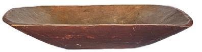 L391 Early 19th century oval Trencher bearing gorgeous original red painted exterior and a wonderful natural patina interior with evidence of significant chop and tool marks from years of use. Circa 1830s 1840s. Hand hewn from a single board with visible carve markings on both the interior and exterior surfaces. Great wear and patina. Age crack to one end that is tight and does not affect integrity of the trencher. Measurements: 21 ¼ long x 11 ½ wide x 4-4 ½ deep (depending on where measured).