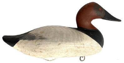 F483 Early Canvasback decoys in original paint by R. Madison Mitchell, signed and daed 1948  renowned decoy carver. Carved in the traditional Havre de Grace, MD style  Decoy is in good condition  original weight remains attached to the bottom