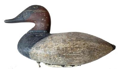 G231 Early canvasback decoy attributed to Ben Dye (1827-1896) of Perryville, Maryland in working repaint with some original paint showing through. Original iron keel and rigging intact on bottom.