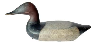 J242 Canvasback Decoy carved by Edwin Pearson (1863-1932) of Havre de Grace, Maryland. Surface has been professionally cleaned down to the original paint. Original weight, ring and staple remain intact on bottom. Image Properties