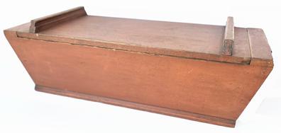 A232 19th century Lancaster County Pennsylvania table top Dough Box in the original red paint. Square head nails with one board construction. One board top with two applied handles. Retains all original surface.  Measurements: 34" long x 14 ½� wide x 11" tall