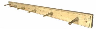 iG325 19th century  Long peg rack in original  mustard paint with six turned pegs, the back board is one wide board with beading at the top and bottom 1" thick 62" long x 4" wide 
