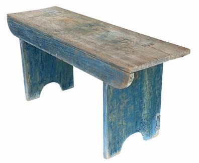 G789 Pennsylvania, original blue painted bench featuring a nice, rounded edge drop apron along the front, ends that are mortised through the top, half-moon cut out feet and a diagonal cross brace that is mortised into the legs. Very sturdy. Measurements: 37 1/2" long x 17" tall x 11 1/2" deep