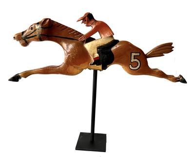 Rare - hand-carved, wooden H C Evans & Company early 1900's Carnival Game Race Horse and Jockey figure in original vibrant polychrome colors. This particular horse bears an oversized '3' painted on his flank. It is extremely rare to find these game horses in such fantastic condition, especially with both the Jockey's hat and the Horse's original hand-carved tail remaining in tact! Mounted on a metal base for display purposes, however it is fully removable. H C Evans & Company was established in Chicago, IL in 1892 and collapsed in 1955. The horse games were some of the earliest - dating to the early 1900s. Measurements: 15 3/4" long x 5 1/2" tall x 1 1/2" thick. Mounted height is 12" to top of Jockey's hat