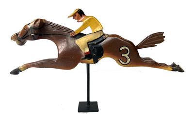 G921 Rare - hand-carved, wooden H C Evans & Company early 1900's Carnival Game Race Horse and Jockey figure in original vibrant polychrome colors. This particular horse bears an oversized '3' painted on his flank. It is extremely rare to find these game horses in such fantastic condition, especially with both the Jockey's hat and the Horse's original hand-carved tail remaining in tact! Mounted on a metal base for display purposes, however it is fully removable. H C Evans & Company was established in Chicago, IL in 1892 and collapsed in 1955. The horse games were some of the earliest - dating to the early 1900s. Measurements: 15 3/4" long x 5 1/2" tall x 1 1/2" thick. Mounted height is 12" to top of Jockey's hat