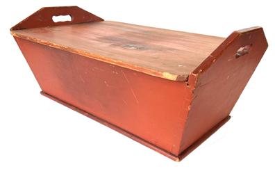 B634 Early 19th century table top Dough Box, This rectangular example, having sharply canted sides with cut out  handles and the original removable lid , with a dovetailed case, remains in original red  paint. Measurements are: 16 1/4'deep x 36 1/2" wide x 11 1/2" tall