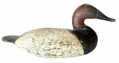 H144 Early Canvasback Drake carved by Ben Dye from Have De Grace MD The decoys is in early and some original paint. In great condition. This bird was made with a flat and wide tail known as a paddle tail 1870-1931 