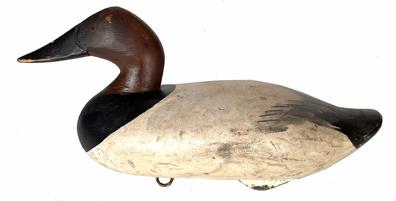 H147 Madison Mitchell Havre de Grace Maryland  Canvasback Decoy  Signed and dated 1965 in original paint. Approximate Measurements: 15 1/2" long x 6" wide x 6 1/2" tall