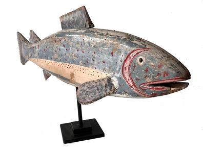 H335 Large wooden Fish weathervane in original paint. Detailed carved fins and tail, along with defined mouth, eyes and gills. Mounted on removable metal stand for display purposes. Circa Measurements: 38 1/2" long x 12" tall x 2 1/2" thick. Overall height on stand is 17 1/2" tall.