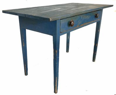 H490 Pennsylvania work table with dovetailed drawer and Hepplewhite tapered legs in original blue painted surface.  Square head nail construction. Apron is mortised into the legs. Very sturdy. Measurements: 45� wide x 22 ¾� deep x 29 ½� tall (22 ½� floor to apron) 5 ½� overhang on each end.