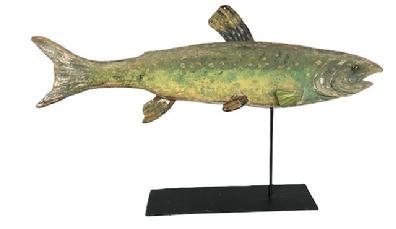 **SOLD** K1848 Wonderful late 19th century New England folk art carved wooden fish weathervane with tin fins and painted tack eyes. The fish retains its old painted and weathered, worn surface. Circa 1900. Mounted on a metal base for display purposes. Measurements 18 long 8 1/2 tall. 