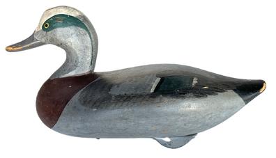 K1681 Signed and dated Wigeon Duck Decoy carved by R. Madison Mitchell (1901-1993) from Havre de Grace Maryland. Decoy retains its original painted surface and bears electric pencil signature / date: "R. Madison Mitchell  1960, along with original weight, staple and ring on bottom. Decoy has a great dry surface never oiled or waxed. 