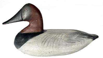 J232 Upper Susquehanna Canvasback Decoy � carver unknown. Working repaint surface. Original staple, ring and weight intact on bottom. 