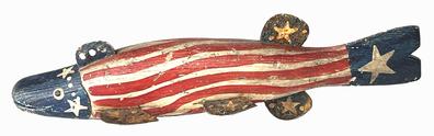 **SOLD** J280 Mid-19th century hand carved Folk Art Patriotic Fish Decoy featuring original red, white and blue painted surface. Wooden body features carved details on the tail, gills, and mouth areas.