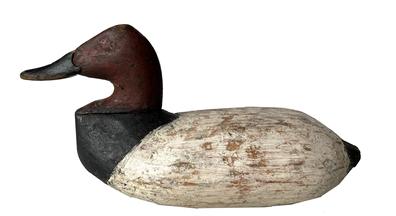 J328 Upper Susquehanna Flats Canvasback Decoy � very folky carving � carver unknown. Original weight and rigging intact on bottom.