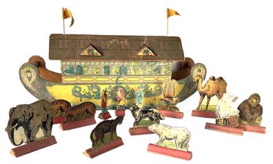 J403 Early 20th century Lithographed paper on wood Noah's Ark Toy with 10 lithographed cardboard animals with wooden bases, three lithographed cardboard people with wooden bases and two cloth flags for the roof of the ark. Both wooden roof supports are also present � and retain the lithographed paper on each of the ends. The cardboard top of the Ark has a few splits that have been secured with tape. Circa 1920�s � 1930�s. Measurements: 17 ¼� long x 3 ¾� wide x 6 ¾� tall. 