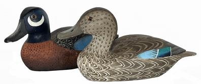 J92 Pair of blue Wing Teal Decoys carved by J. Newnam Valliant of Bellevue, Talbot County, Maryland. Bottom of each decoy reads �J. N. Valliant 1967� �To our Wonderful Redhead � Pauline and Newnam� Approximate measurements: 9 ½� long x 4 ¼� tall x 3 ½� wide