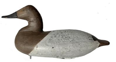 RM1478 Rare Canvasback Hen Decoy carved by George Washington "Wash" Barnes (1862-1915) of Carpenter's Point (Cecil County), Maryland. Branded �JH� on the underside of tail. Original staple and ring remain intact on bottom. Circa 1880. Crack in neck.   