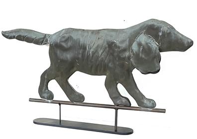 W370 Early 20th century copper Dog weathervane with weathered surface and good color. Hollow body with soldered seams and finely cut edges to simulate fur. Minor dents. Dog measures 18"high x 33" long. Base measures 18 long x 3 wide.