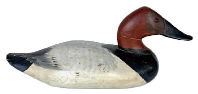 L10 Upper Bay Canvasback Drake Duck Decoy carved by Madison Mitchell of Havre de Grace, MD (1901-1993). Branded GWK on the bottom.  Original painted surface with glass eyes that were added later.  