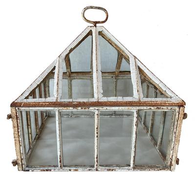 H310 Antique Cast Iron Garden Cloche c.1900.A VICTORIAN WEATHERED WHITE PAINTED CAST IRON FRAME CLOCHE OR TERRARIUM Of square glazed panel form, the canted pitched top with a raised handle, Superb cloche in the form of a miniature pyramid top glasshouse. The top lifts off to stop it getting too warm inside during the day. Good unrestored condition.  Measurements: 17 34/" x 17 1/2" x approximately 18 1/2" tall to top of handle.