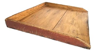 M172 Late 19th century Noodle board, found in Pennsylvania. These were sometimes referred to as a Dough Board, as these boards were used for multiple purposes such as on a kitchen counter for rolling out dough. A gallery is attached with early wire nails. The tapered edge gallery, as well as the bottom, bears the original red painted surface. Beautiful patina with nice wear indicative of age and use. Circa 1860s 1880s. Measurements: 27 ¼ wide x 22 ¾ deep x 2 ¾ tall.