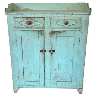 K136 Mid-19th century Pennsylvania original robin egg blue painted Jelly Cupboard featuring an applied dovetailed gallery, two dovetailed drawers over two fully mortised and pegged doors, nice high cut out foot, and half-moon cut out ends. Circa 1850s. The natural patina interior boasts sturdy shelves for storage. Measurements: 43 wide x 17 deep x 51 ¾ tall (back) x 47 5/8 tall (front)   