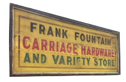 C520 Late 19th century Trade Sign from upstate New York, Frank Fountain Carriages and Hardware, painted on board, with applied molding, great colors of yellow back ground with black, red and green, lettering