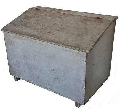 J349 Early 19th century Grain Bin bearing original gray paint with a dovetailed case and shoe feet.  Slanted lift-lid opens to reveal a clean, divided interior. Measurements: 37 3/8� wide x 22� deep x 27 1/4� tall (back) x 22 1/2� tall (front)