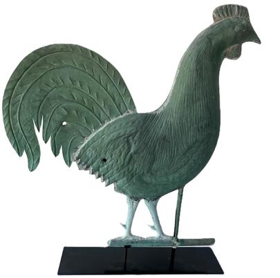 L38 Spectacular oversized American late 19th century hollow bodied Copper Rooster Weathervane with zinc legs and verdigris surface. Full body style with a realistically shaped high tail bearing feather impressions. Tight solder seams throughout. Custom heavy metal stand included for display purposes. Measurements: 25 wide x ~28 ½ tall (30 ½ tall on stand). Base measures 20 long x 5 wide.     