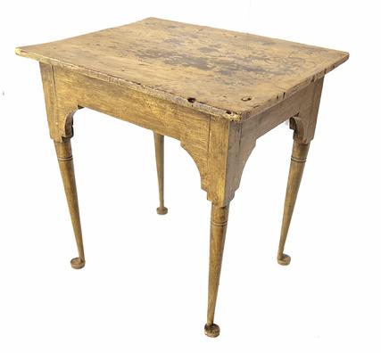 RM1414 18th century Queen Anne side table with padded feet in old yellow painted surface. One board top. Decorative cut out apron. Apron is fully mortised and pegged into the turned legs. Measurements: 26 3/8� long x 20 ½� wide x 27� tall. 